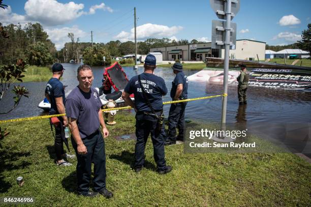 Members of the St. Johns County Fire Rescue conduct operations in flood waters caused by Hurricane Irma September 12, 2017 in Hastings, Florida,...