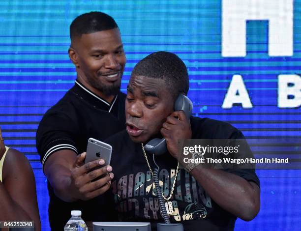 In this handout photo provided by Hand in Hand, Jamie Foxx and Tracy Morgan caption at ABC News' Good Morning America Times Square Studio on...