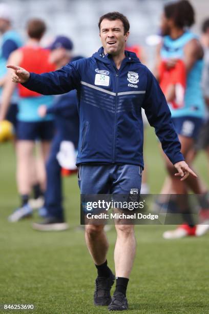 Cats head coach Chris Scott kindly gestures to staff for media to leave during the Geelong Cats AFL training session at Simonds Stadium on September...