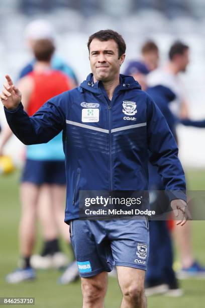 Cats head coach Chris Scott kindly gestures to staff for media to leave during the Geelong Cats AFL training session at Simonds Stadium on September...