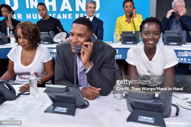 In this handout photo provided by Hand in Hand, Gayle King, Michael Strahan and Lupita Nyong'o caption at ABC News' Good Morning America Times Square...
