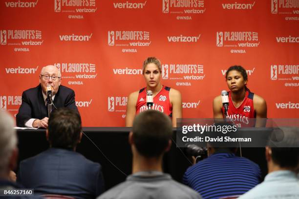 Head coach Mike Thibault with Elena Delle Donne and Tierra Ruffin-Pratt of the Washington Mystics speaks at a post game press conference after the...