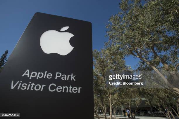 Apple Inc. Signage stands on the Apple campus after an event in Cupertino, California, U.S., on Tuesday, Sept. 12, 2017. Apple unveiled its most...