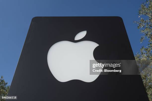 Apple Inc. Signage stands on the Apple campus after an event in Cupertino, California, U.S., on Tuesday, Sept. 12, 2017. Apple unveiled its most...