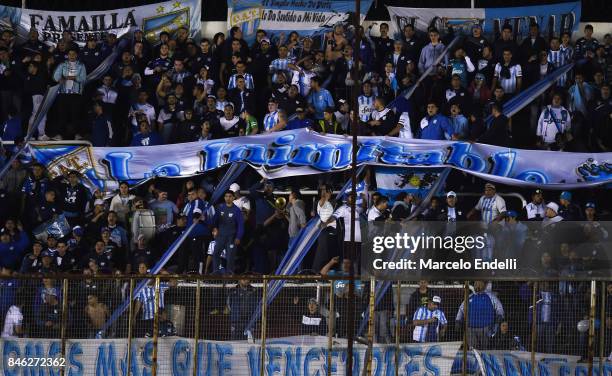 Fans of Atletico Tucuman cheer for their team during a second leg match between Independiente and Atletico Tucuman as part of round of 16 of Copa...