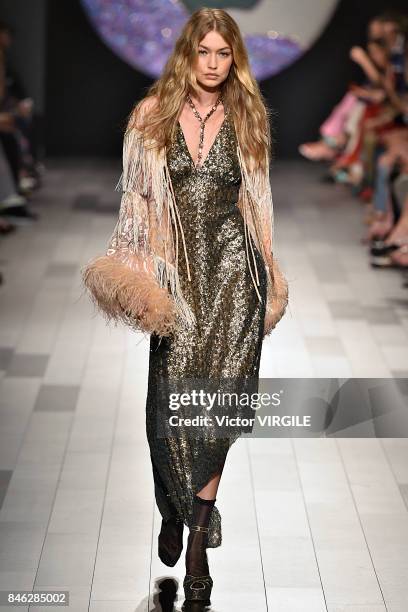 Gigi Hadid walks the runway at the Anna Sui Ready to Wear Spring/Summer 2018 fashion show during New York Fashion Week on September 11, 2017 in New...