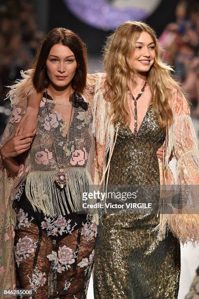 Bella Hadid and Gigi Hadid walks the runway at the Anna Sui Ready to Wear Spring/Summer 2018 fashion show during New York Fashion Week on September...