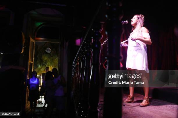 Performer sings in the famed Gafieira Estudantina, founded in 1928, during forro night on September 12, 2017 in Rio de Janeiro, Brazil. The classic...