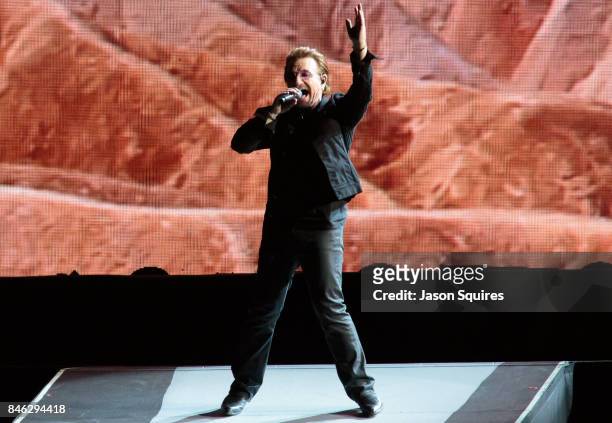 Singer Bono of U2 performs during the Joshua Tree Tour at Arrowhead Stadium on September 12, 2017 in Kansas City, Missouri.