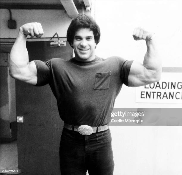 Lou Ferrigno Actor and Bodybuilder with arms up showing muscles, March 1980.