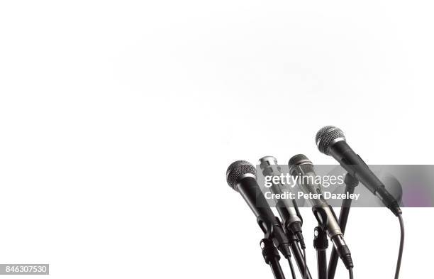 copy space and microphones - empty press conference stock pictures, royalty-free photos & images