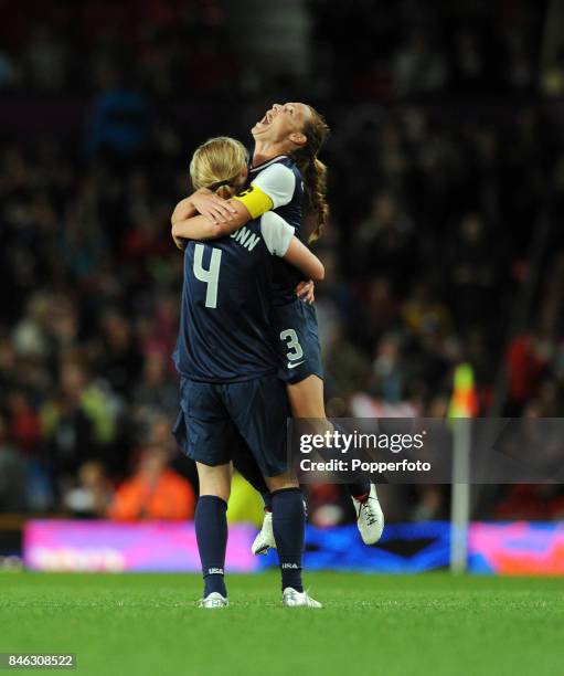 Christie Rampone of the USA celebrates with her team mate Becky Sauerbrunn during the Women's Football Semi Final match between Canada and USA, on...