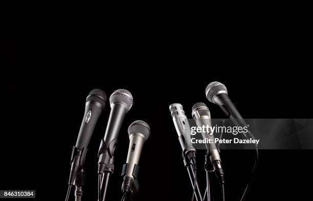 close up of press conference microphones - england press conference stock pictures, royalty-free photos & images