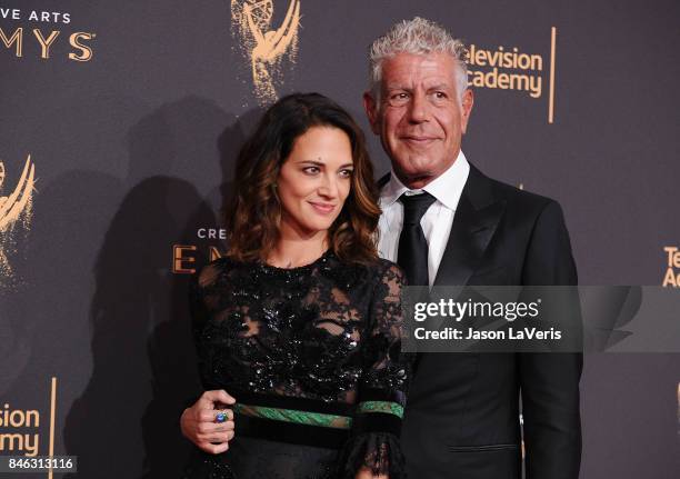 Asia Argento and Anthony Bourdain attend the 2017 Creative Arts Emmy Awards at Microsoft Theater on September 9, 2017 in Los Angeles, California.