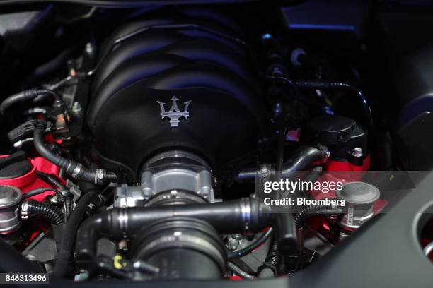 Logo sits on the engine block of a Maserati GranTurismo luxury automobile, manufactured by Maserati SpA, during the first media preview day of the...