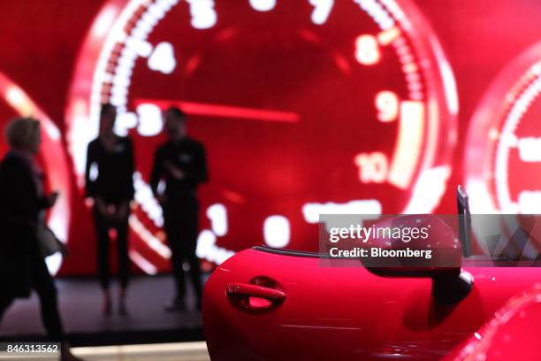 The door of a Mazda MX5 automobile, manufactured by Mazda Motor Corp., sits open during the first media preview day of the IAA Frankfurt Motor Show...