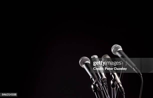 microphones with copy space - england press conference stock pictures, royalty-free photos & images