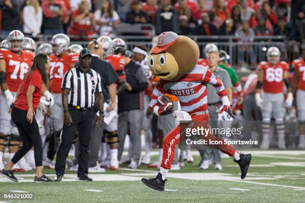Ohio State mascot Brutus performs on the field during a timeout during game action between the Oklahoma Sooners and the Ohio State Buckeyes on...