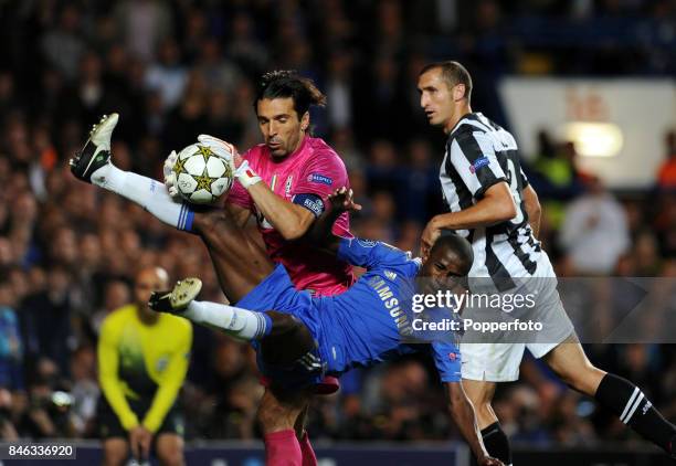 Ramires of Chelsea with Giorgio Chiellini and Gianluigi Buffon both of Juventus in action during the UEFA Champions League match between Chelsea and...