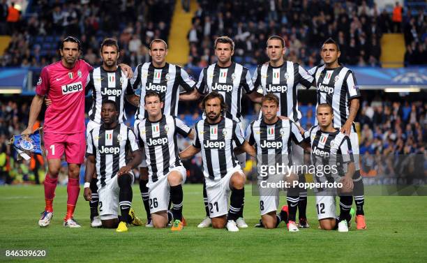 The Juventus team pose for a group picture prior to the UEFA Champions League match between Chelsea and Juventus at Stamford Bridge on September 19,...