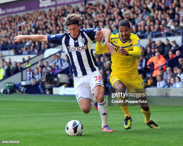Billy Jones of West Bromwich Albion and Jobi McAnuff of Reading in action during the Barclays Premier League match between West Bromwich Albion and...