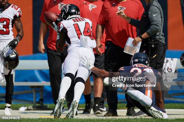 Atlanta Falcons wide receiver Justin Hardy battles with Chicago Bears cornerback Kyle Fuller to catch the football during an NFL football game...