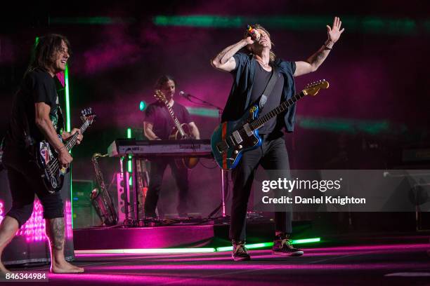 Musicians John Rzeznik and Robby Takac of Goo Goo Dolls perform on stage at Cal Coast Credit Union Open Air Theatre on September 12, 2017 in San...