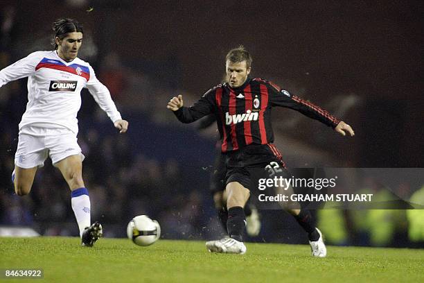 Pedro Mendes of Rangers vies with David Beckham of AC Milan during a friendly football match between Rangers and AC Milan at Ibrox Stadium, Glasgow,...