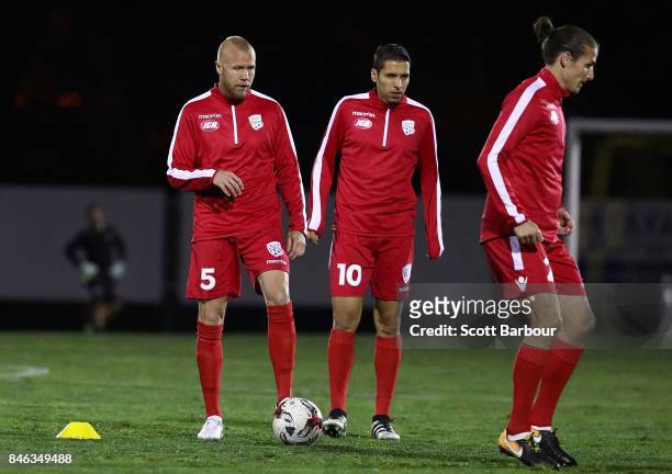 Adelaide United players warm up during the FFA Cup Quarter Final match between Heidelberg United FC and Adelaide United at Olympic Village on...