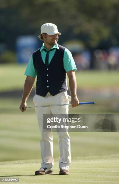 Ryan Moore watches is putt on the 11th green during the final round of the FBR Open on February 1, 2009 at TPC Scottsdale in Scottsdale, Arizona.