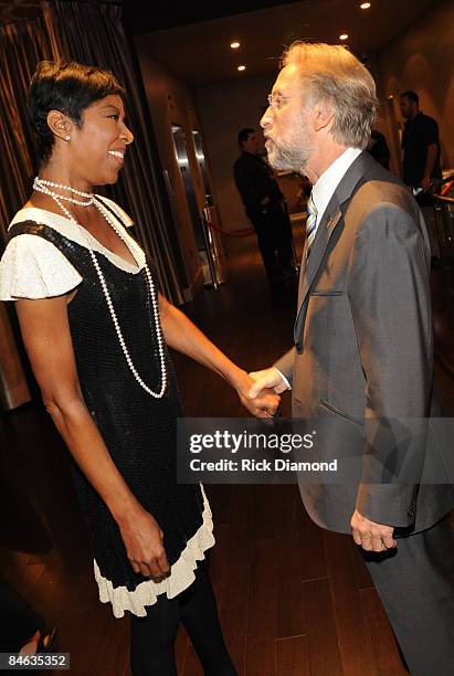 Recording Artist and Host Natalie Cole with President/CEO of The Recording Academy Neil Portnow backstage at The Recording Academy's tribute to Blue...