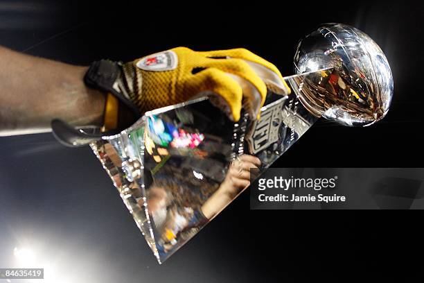 Players from the Pittsburgh Steelers celebrate with the Vince Lombardi trophy after their 27-23 win against the Arizona Cardinals during Super Bowl...