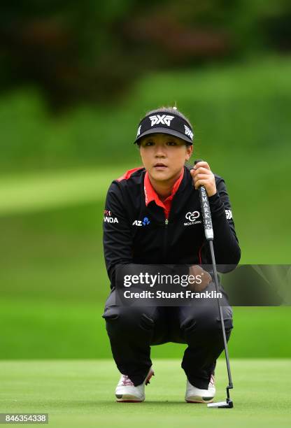 Lydia Ko of New Zealand lines up a putt during the pro - am prior to the start of The Evian Championship at Evian Resort Golf Club on September 13,...