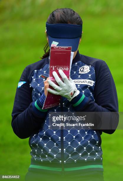 Defending Champion In Gee Chun of South Korea checks her yardage during the pro - am prior to the start of The Evian Championship at Evian Resort...