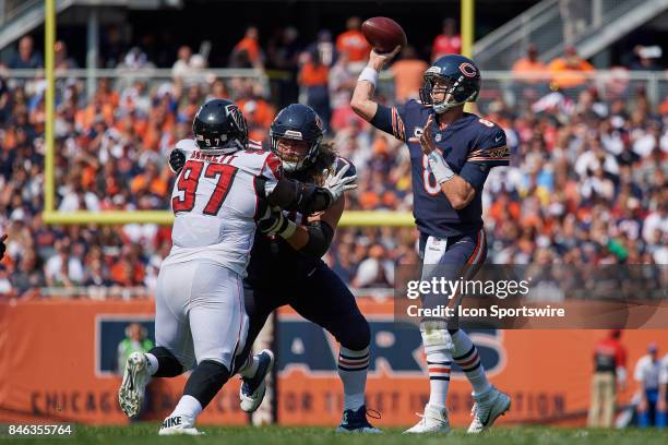 Atlanta Falcons defensive tackle Grady Jarrett battles with Chicago Bears center Cody Whitehair as Chicago Bears quarterback Mike Glennon throws the...