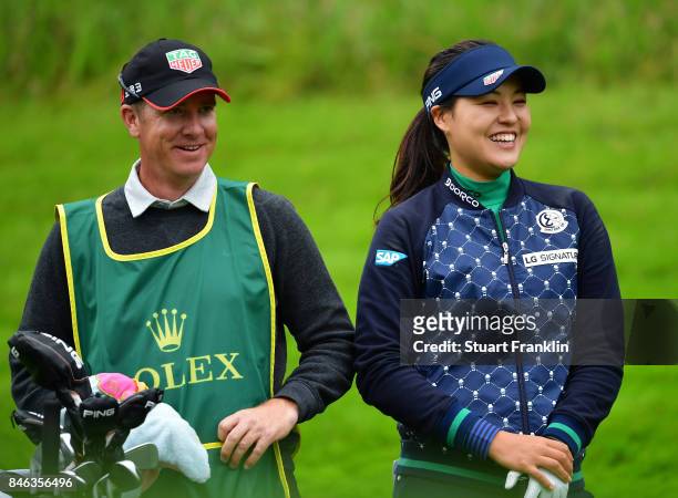 Defending Champion In Gee Chun of South Korea looks happy with her caddie during the pro - am prior to the start of The Evian Championship at Evian...