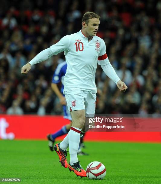 Wayne Rooney of England in action during the FIFA 2014 World Cup qualifying match between England and San Marino at Wembley Stadium on October 12,...