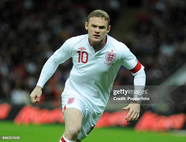 Wayne Rooney of England in action during the FIFA 2014 World Cup qualifying match between England and San Marino at Wembley Stadium on October 12,...