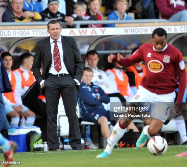 Aidy Boothroyd, manager of Northampton Town, reacts during the npower League Two match between Northampton Town and Exeter City at Sixfields Stadium...