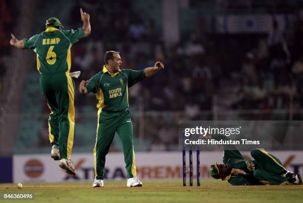 Champions Trophy: South African team celebrates after run out of Mahela Jayawardene in the ICC Champions Trophy at the Sardar Patel Gujarat Stadium,...