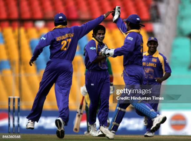 Champions Trophy: Sri Lankas bowler Chaminda Vaas celebrates after the dismissal of South African captain Graeme Smith in the ICC Champions Trophy at...