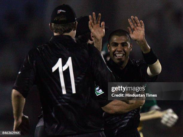 New Zealand's bowler Jeetan Patel celebrates the wicket of South Africa's Makhaya Ntini during their ICC Champions Trophy match at CCI on Monday.