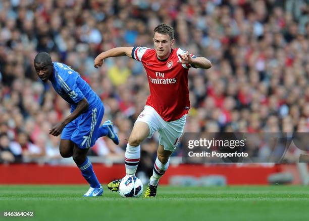 Aaron Ramsey of Arsenal and Ramires of Chelsea in action during the Barclays Premier League match between Arsenal and Chelsea at the Emirates Stadium...