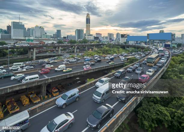 aerial view expressway with traffic jam in bangkok . - traffic jams in bangkok fotografías e imágenes de stock