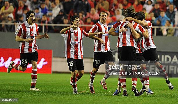 Athletic Bilbao's Yeste Llorente celebrates with teammates Yeste Iraola, Javi Martinez and Aitor Ocio after scoring against Sevilla during their...