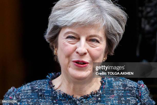 Britain's Prime Minister Theresa May leaves 10 Downing Street in central London on September 13 on her way to the Houses of Parliament to speak at...