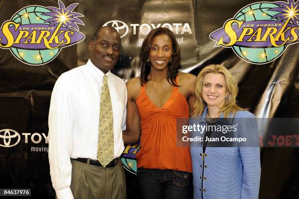 Los Angeles Sparks head coach Michael Cooper, Sparks center Lisa Leslie and Sparks co-owner Carla Christofferson pose for a photo after Lisa Leslie's...