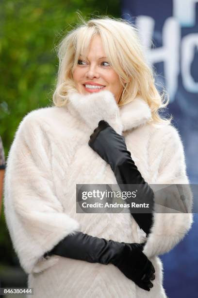 Pamela Anderson arrives for a photocall for the show 'House of Mystery' by Illusionist Hans Klok on September 13, 2017 in Cologne, Germany.