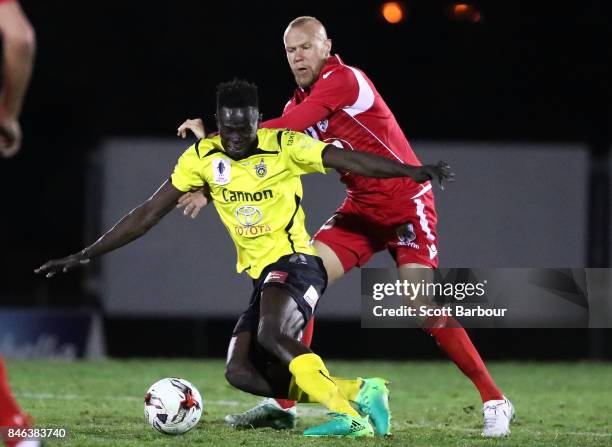 Ken Athiu of Heidelberg United FC competes for the ball during the FFA Cup Quarter Final match between Heidelberg United FC and Adelaide United at...