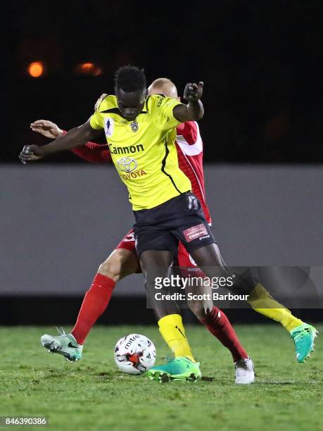 Ken Athiu of Heidelberg United FC competes for the ball during the FFA Cup Quarter Final match between Heidelberg United FC and Adelaide United at...
